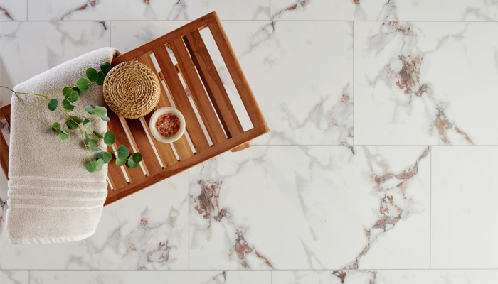 stone look flooring with bath tray
